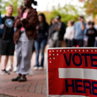 People stand in line during the last day of early voting, November 2, 2024, in Charlotte, North Carolina. (AP Photo/Mike Stewart, file)