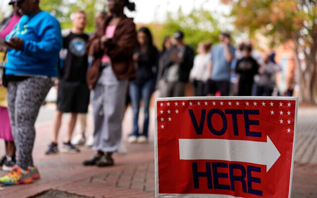 People stand in line during the last day of early voting, November 2, 2024, in Charlotte, North Carolina. (AP Photo/Mike Stewart, file) People stand in line during the last day of early voting, November 2, 2024, in Charlotte, North Carolina. (AP Photo/Mike Stewart, file)