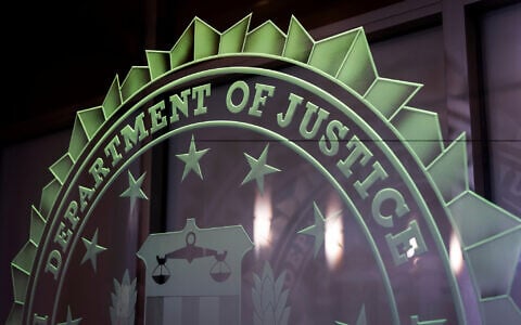 Illustrative: A sign reading Department of Justice is displayed at the FBI field office, in Portland, Oregon. January 16, 2025. (AP Photo/Jenny Kane, File)
