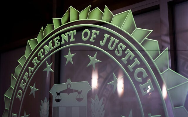 Illustrative: A sign reading Department of Justice is displayed at the FBI field office, in Portland, Oregon. January 16, 2025. (AP Photo/Jenny Kane, File)