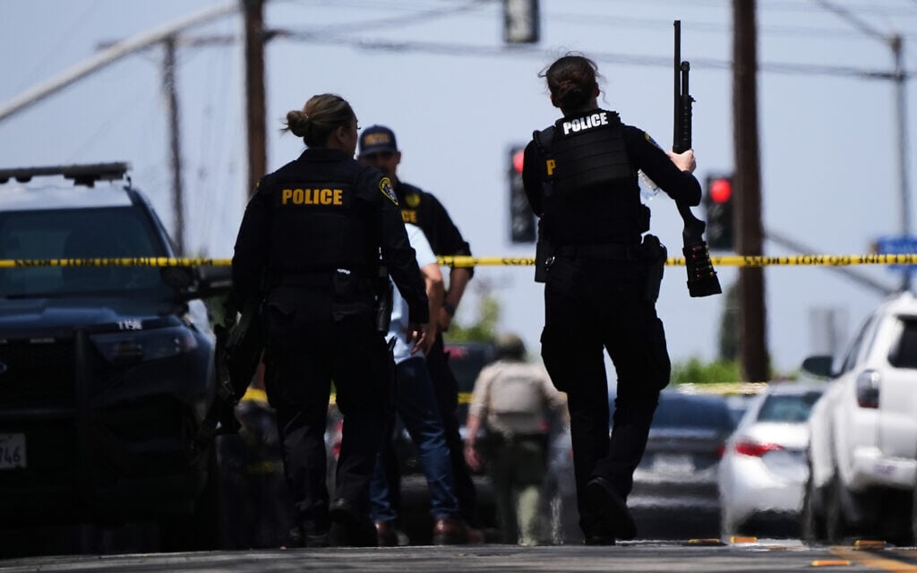 Police at the scene of a shooting outside the Islamic Center of San Diego, in San Diego, California, May 18, 2026. (AP Photo/Gregory Bull)