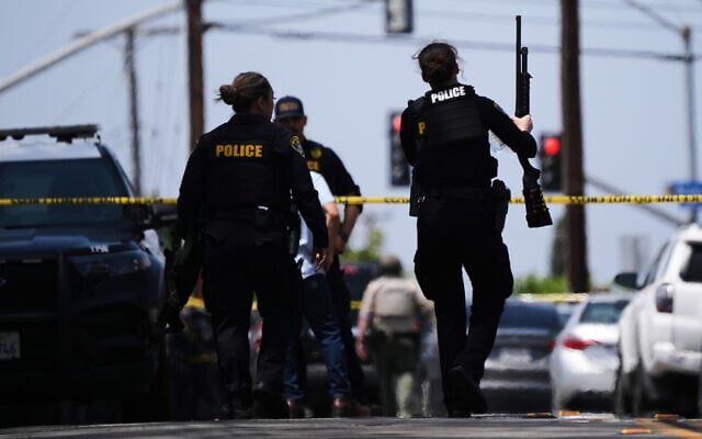 Police at the scene of a shooting outside the Islamic Center of San Diego, in San Diego, California, May 18, 2026. (AP Photo/Gregory Bull)