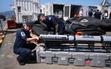 UK Royal Navy personnel inspect autonomous vehicles with sonar sensors that can detect and identify mines, on RFA Lyme Bay, in British Overseas Territory of Gibraltar, on May 22, 2026. (AP Photo/Kwiyeon Ha)