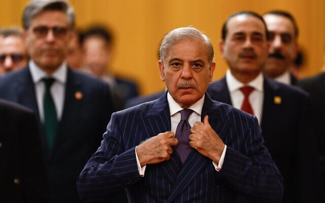 Pakistan's Prime Minister Shehbaz Sharif arrives for a meeting with Chinese President Xi Jinping at the Great Hall of the People, in Beijing, China, Monday May 25, 2026. (Tingshu Wang/Pool Photo via AP)