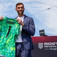 Goalkeeper Matt Turner, of the United States men's national soccer team, displays his jersey during the announcement of the team's 2026 FIFA World Cup roster, in New York City, May 26, 2026. (Eduardo Munoz Alvarez/AP)