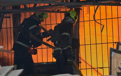 Firefighters work on the site of a burning building after a Russian missile attack in Kyiv, Ukraine, June 2, 2026. (Efrem Lukatsky/AP)