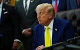 US President Donald Trump listens at an event about coal, on June 4, 2026, in the Oval Office of the White House in Washington. (AP Photo/Julia Demaree Nikhinson)
