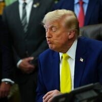 US President Donald Trump listens at an event about coal, on June 4, 2026, in the Oval Office of the White House in Washington. (AP Photo/Julia Demaree Nikhinson)