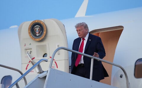US President Donald Trump arrives on Air Force One, Friday, June 5, 2026, at Morristown Airport in Morristown, N.J. (AP Photo/Mark Schiefelbein)