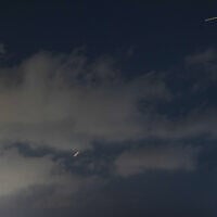 An Israeli air defense system fires to intercept missiles that were launched from Iran, as seen from Hadera, northern Israel, Sunday, June 7, 2026. (AP Photo/Ariel Schalit)