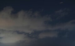 An Israeli air defense system fires to intercept missiles that were launched from Iran, as seen from Hadera, northern Israel, Sunday, June 7, 2026. (AP Photo/Ariel Schalit)