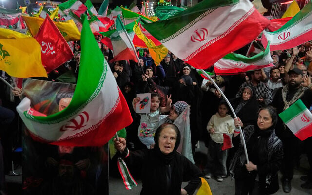 Pro-government demonstrators wave Iranian and Hezbollah flags in Tehran, Iran, on June 7, 2026. (AP Photo/Vahid Salemi) Pro-government demonstrators wave Iranian and Hezbollah flags in Tehran, Iran, on June 7, 2026. (AP Photo/Vahid Salemi)
