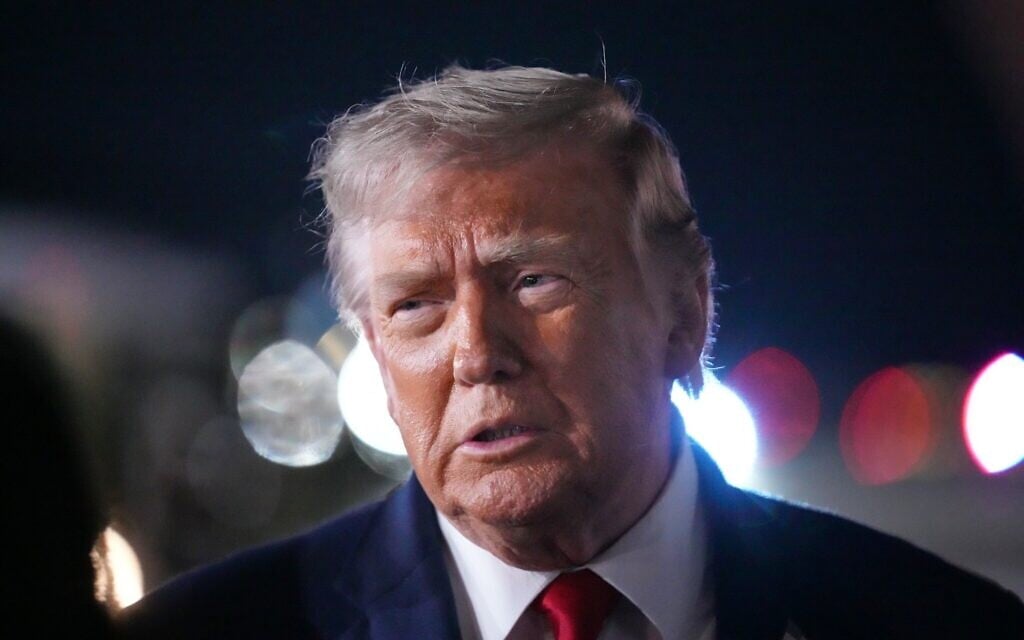 US President Donald Trump talks with reporters before boarding Air Force One at John F. Kennedy International Airport in New York, June 9, 2026. (AP Photo/Mark Schiefelbein)