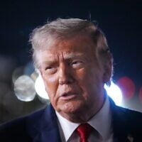 US President Donald Trump talks with reporters before boarding Air Force One at John F. Kennedy International Airport in New York, June 9, 2026. (AP Photo/Mark Schiefelbein)
