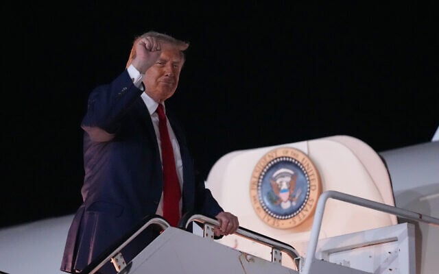 US President Donald Trump gestures as he boards Air Force One at John F. Kennedy International Airport in New York, June 8, 2026. (AP Photo/Mark Schiefelbein) US President Donald Trump gestures as he boards Air Force One at John F. Kennedy International Airport in New York, June 8, 2026. (AP Photo/Mark Schiefelbein)