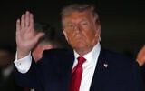 US President Donald Trump gestures as he steps off Air Force One, June 9, 2026, at Joint Base Andrews, Maryland (AP/Mark Schiefelbein)