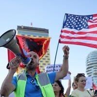 Protesters take part in a rally in Tirana, Albania, June 9, 2026, against the construction of a massive coastal development project linked to Jared Kushner and Ivanka Trump at Narta lagoon area, western Albania. (AP Photo/Hameraldi Agolli)