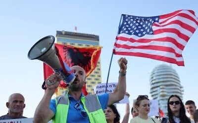 Protesters take part in a rally in Tirana, Albania, June 9, 2026, against the construction of a massive coastal development project linked to Jared Kushner and Ivanka Trump at Narta lagoon area, western Albania. (AP Photo/Hameraldi Agolli)