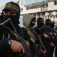 FILE - Palestinian gunmen from Hamas and Islamic Jihad gather next to Eid al-Fitr prayers in Gaza City, March 20, 2026. (AP Photo/Abdel Kareem Hana, File)