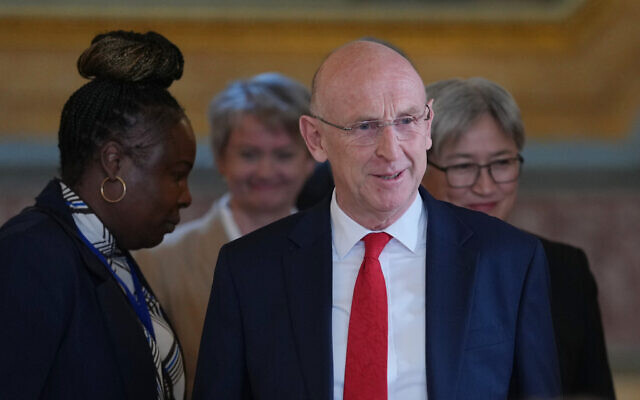 UK Defence Secretary John Healey walks into the press conference following the AUKMIN Summit, at Lancaster House in London, June 10, 2026. (Kin Cheung/AP) UK Defence Secretary John Healey walks into the press conference following the AUKMIN Summit, at Lancaster House in London, June 10, 2026. (Kin Cheung/AP)