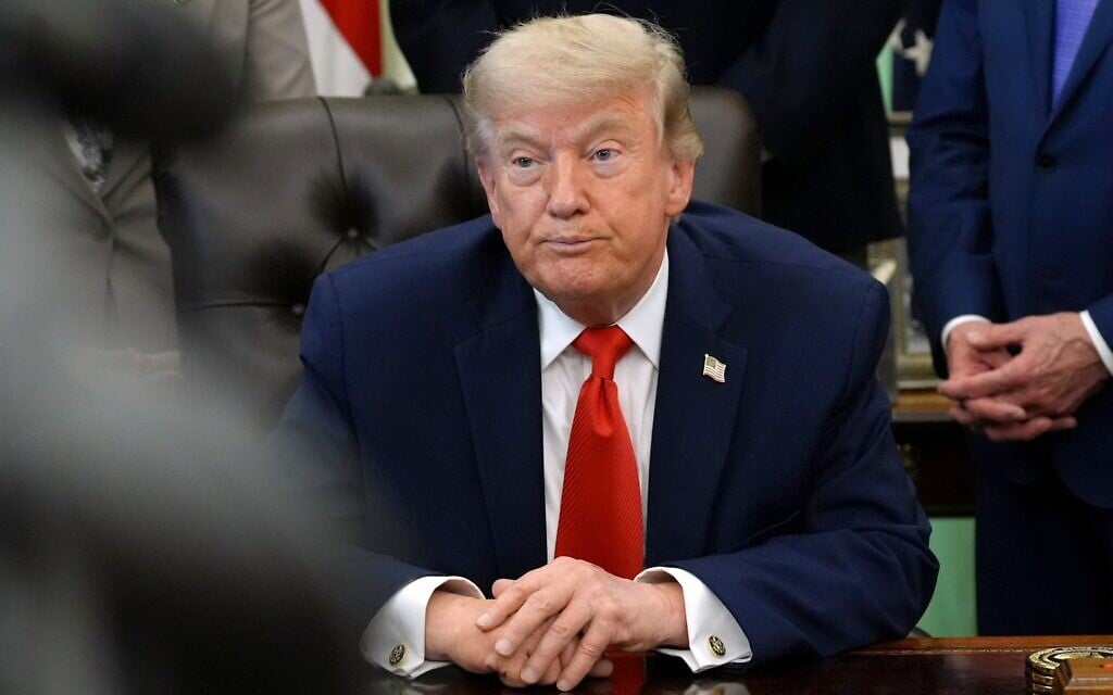 US President Donald Trump listens during an event to sign a proclamation about the fishing industry, in the Oval Office of the White House, June 11, 2026, in Washington. (AP Photo/Jacquelyn Martin)