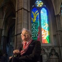 British artist David Hockney sits in front of The Queen's Window, a new stained glass window at Westminster Abbey, London, that he designed, on Sept. 26, 2018. (Victoria Jones/Pool via AP, File)