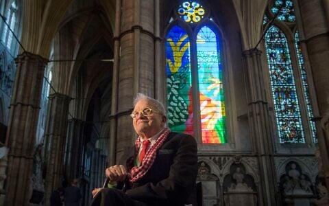 British artist David Hockney sits in front of The Queen's Window, a new stained glass window at Westminster Abbey, London, that he designed, on Sept. 26, 2018. (Victoria Jones/Pool via AP, File)