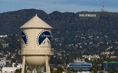 The Paramount Pictures water tower is seen in Los Angeles, Dec. 18, 2025, with the Hollywood sign in the distance. (AP Photo/Jae C. Hong,File)