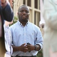 Adrian Boafo, a Maryland state delegate and Democratic candidate for US Congress talks with supporters at the "AmeriPac Bull Roast," June 12, 2026, in Mitchellville, Maryland. (AP Photo/Gail Burton)