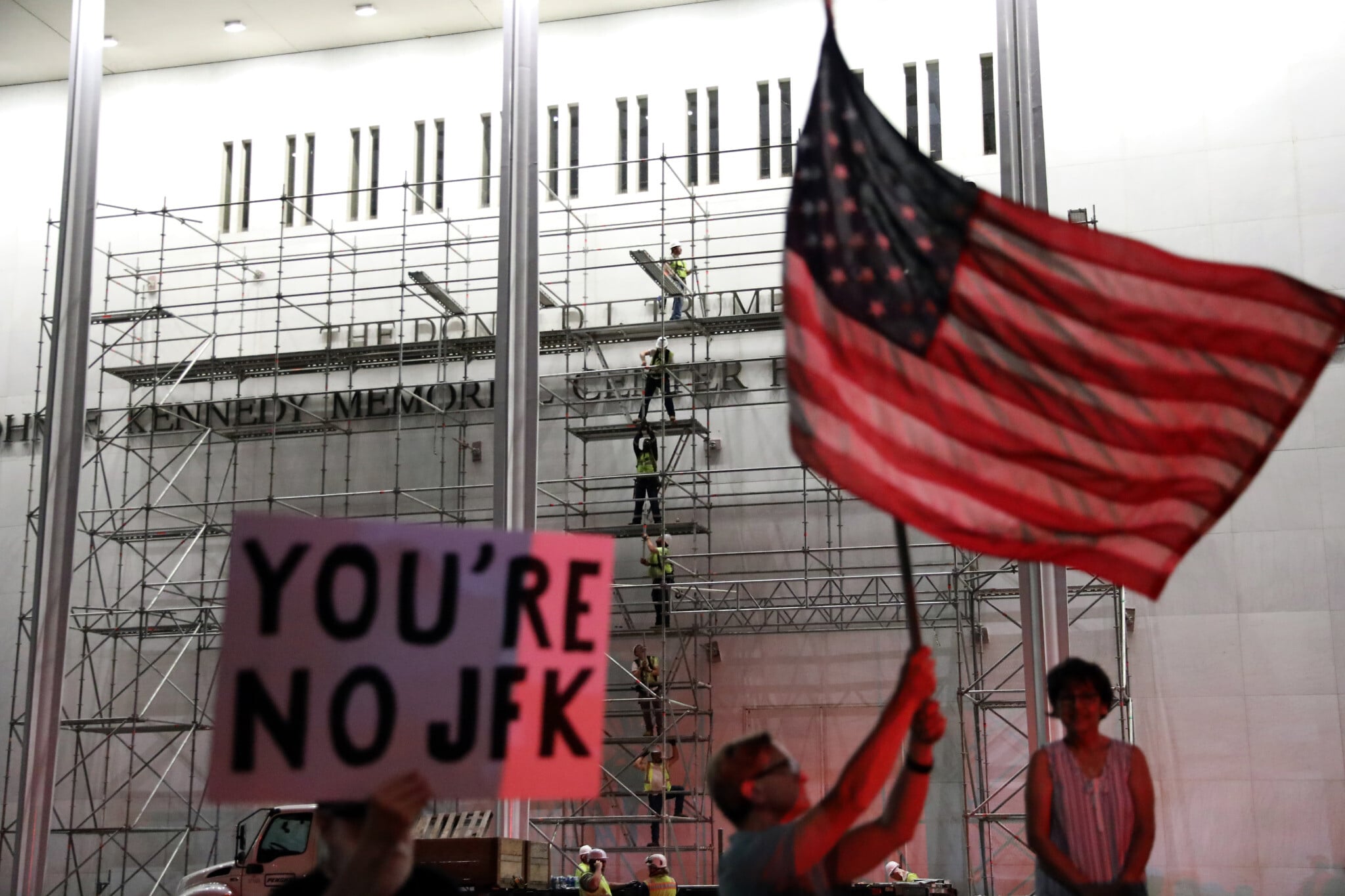 Workers begin removing Trump’s name from Kennedy Center, hours after court...