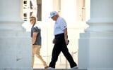 President Donald Trump walks to board his limousine at the North Portico of the White House, June 13, 2026, in Washington. (AP Photo/Mark Schiefelbein)