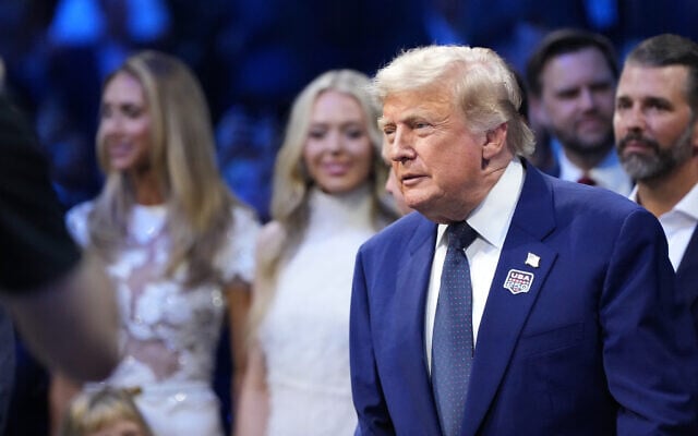 US President Donald Trump attends the UFC Freedom 250 on the South Lawn of the White House, Sunday, June 14, 2026, in Washington with Lara Trump, Tiffany Trump and Donald Trump Jr. (AP/Alex Brandon)