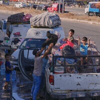 Displaced people pack their belongings as they prepare to return to their village following the announcement of an initial ceasefire agreement between the United States and Iran, in the southern port city of Sidon, Lebanon, June 15, 2026. (Mohammed Zaatari/AP)