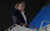 US President Donald Trump gestures as he boards Air Force One, June 15, 2026, at Joint Base Andrews, Maryland. (AP Photo/Julia Demaree Nikhinson)