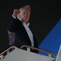 US President Donald Trump gestures as he boards Air Force One, Monday, June 15, 2026, at Joint Base Andrews, Md. (AP Photo/Julia Demaree Nikhinson)