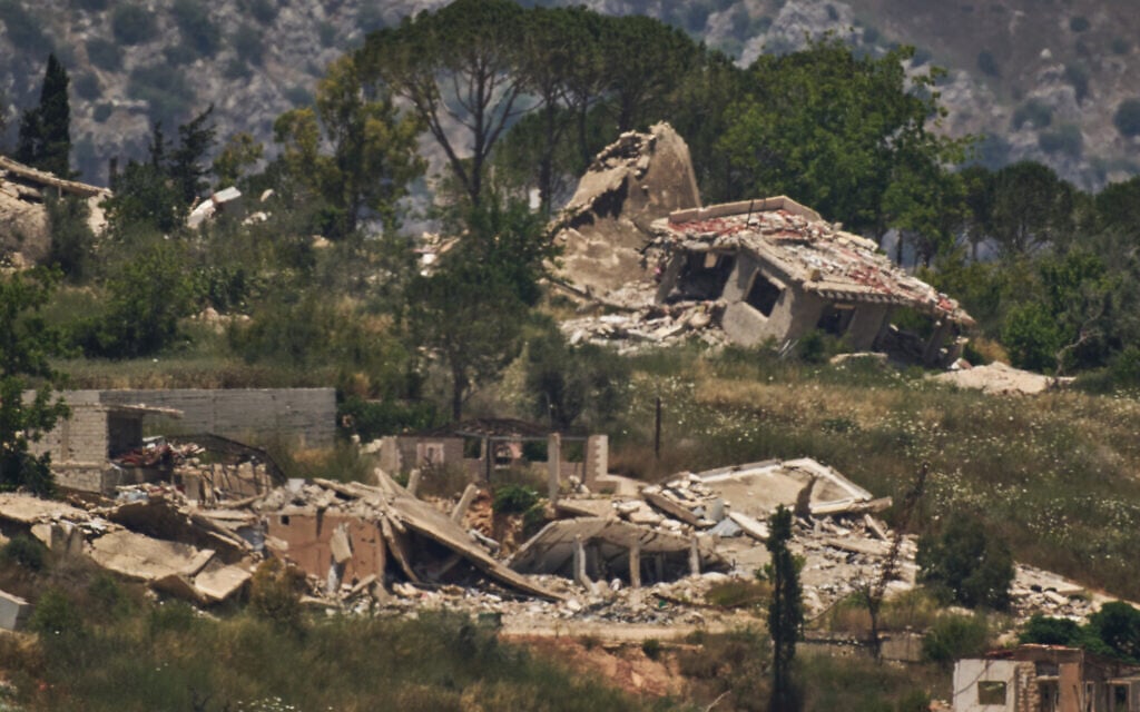Destroyed buildings in southern Lebanon as seen from northern Israel, Monday, June 15, 2026. (AP Photo/Leo Correa)