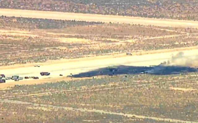 This image taken from video provided by KABC shows law enforcement responding to the scene of an aircraft crash, June 15, 2026, near Edwards Air Force Base, California. (KABC via AP) This image taken from video provided by KABC shows law enforcement responding to the scene of an aircraft crash, June 15, 2026, near Edwards Air Force Base, California. (KABC via AP)