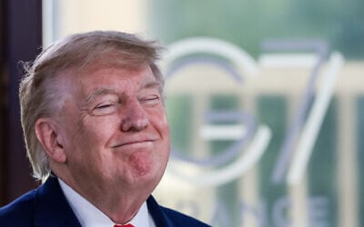 U.S. President Donald Trump attends a working lunch with leaders of G7 and the Middle East, in Evian-les-Bains, France, Tuesday, June 16, 2026. (Evelyn Hockstein/Pool Photo via AP)