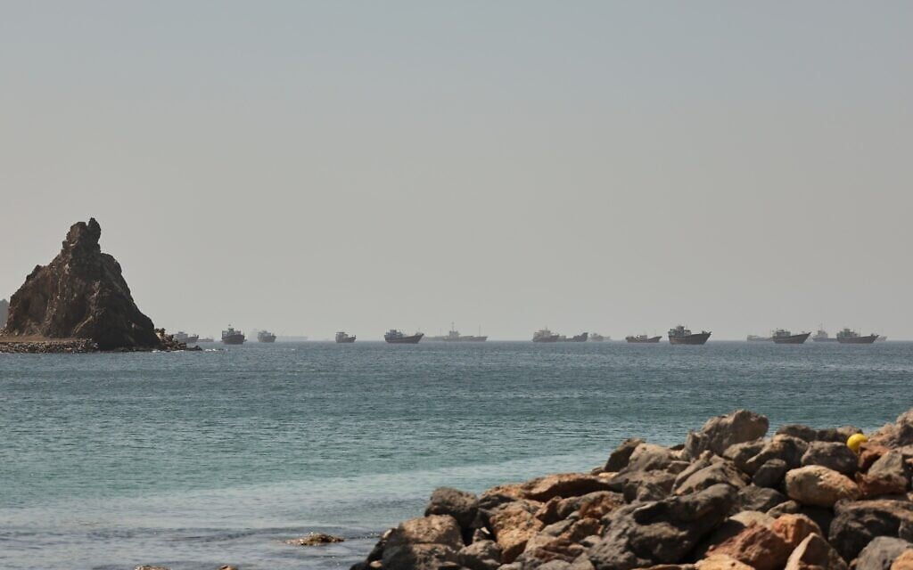 Tankers and cargo vessels are seen in the Gulf of Oman, along shipping routes linking the Strait of Hormuz and the Arabian Sea, June 16, 2026. (AP Photo)