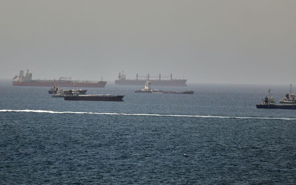Tankers and cargo vessels are seen in the Gulf of Oman, along shipping routes linking the Strait of Hormuz and the Arabian Sea, June 16, 2026. (AP Photo)