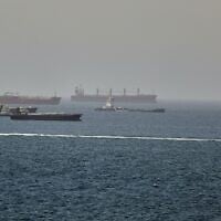 Tankers and cargo vessels are seen in the Gulf of Oman, along shipping routes linking the Strait of Hormuz and the Arabian Sea, June 16, 2026. (AP Photo)