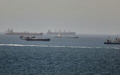 Tankers and cargo vessels are seen in the Gulf of Oman, along shipping routes linking the Strait of Hormuz and the Arabian Sea, June 16, 2026. (AP Photo)