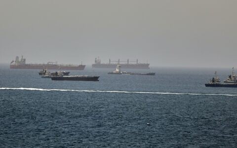 Tankers and cargo vessels are seen in the Gulf of Oman, along shipping routes linking the Strait of Hormuz and the Arabian Sea, June 16, 2026. (AP Photo)