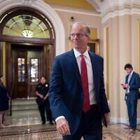 US Senate Majority Leader John Thune walks from the chamber to his office at the Capitol in Washington, June 16, 2026. (AP Photo/J. Scott Applewhite)