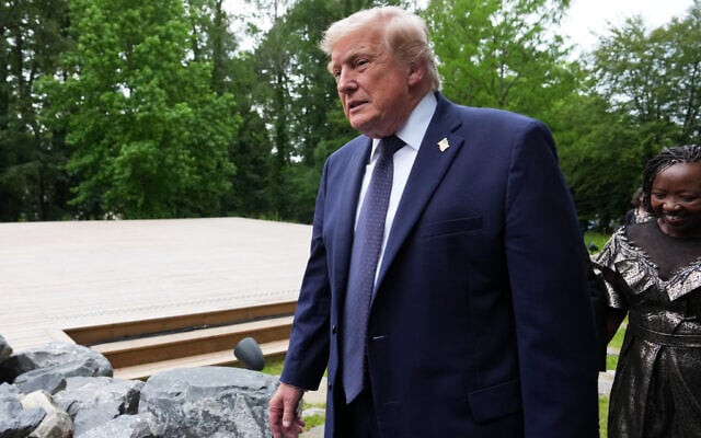 US President Donald Trump walks away after a group photo of leaders at the G7 summit, in Evian-les-Bains, France, June 16, 2026. (Julia Demaree Nikhinson/AP) US President Donald Trump walks away after a group photo of leaders at the G7 summit, in Evian-les-Bains, France, June 16, 2026. (Julia Demaree Nikhinson/AP)