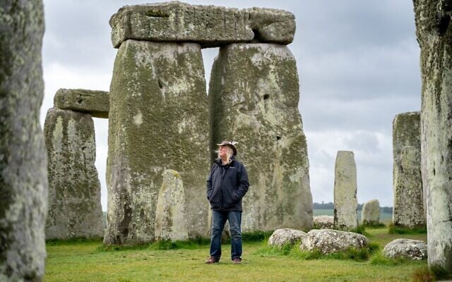 This photo provided by Wessex Archaeology shows archaeologist Phil Harding standing at Stonehenge in May 2026, near Salisbury, England. (Wessex Archaeology via AP) This photo provided by Wessex Archaeology shows archaeologist Phil Harding standing at Stonehenge in May 2026, near Salisbury, England. (Wessex Archaeology via AP)