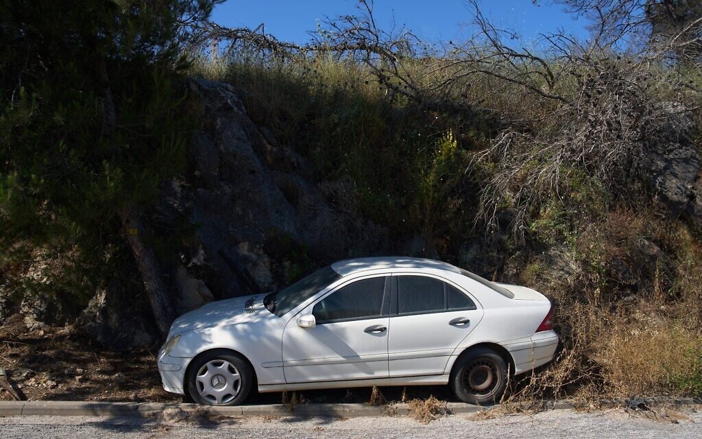 An abandoned car in the community of Metula on the border with Lebanon in northern Israel, June 18, 2026. (AP Photo/Ariel Schalit)