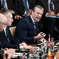 United States Defense Secretary Pete Hegseth, right, speaks during a meeting of the North Atlantic Council in defense ministers format at NATO headquarters in Brussels, June 18, 2026. (AP/Virginia Mayo)