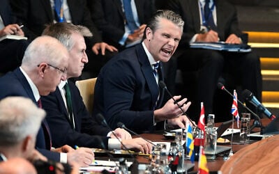 United States Defense Secretary Pete Hegseth, right, speaks during a meeting of the North Atlantic Council in defense ministers format at NATO headquarters in Brussels, June 18, 2026. (AP/Virginia Mayo)