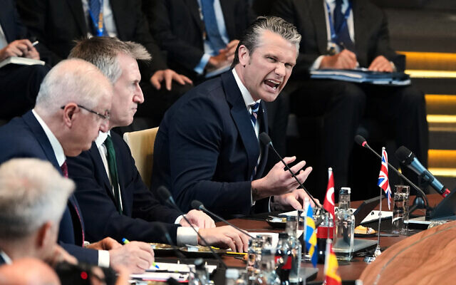 United States Defense Secretary Pete Hegseth, right, speaks during a meeting of the North Atlantic Council in defense ministers format at NATO headquarters in Brussels, June 18, 2026. (AP/Virginia Mayo) United States Defense Secretary Pete Hegseth, right, speaks during a meeting of the North Atlantic Council in defense ministers format at NATO headquarters in Brussels, June 18, 2026. (AP/Virginia Mayo)
